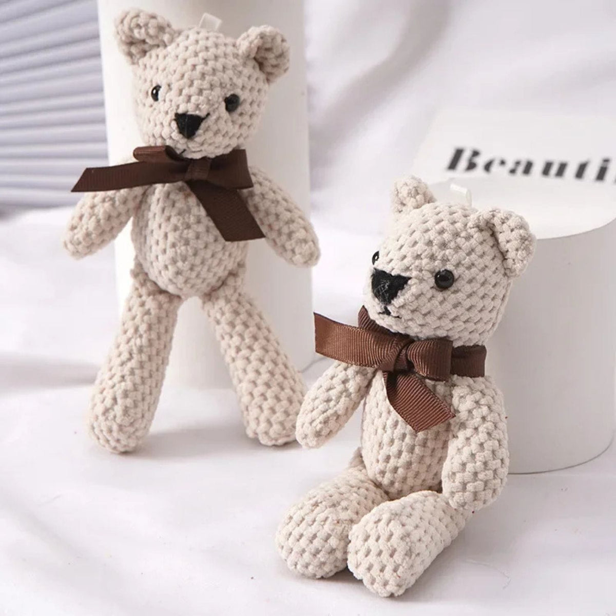 Mini ours en peluche